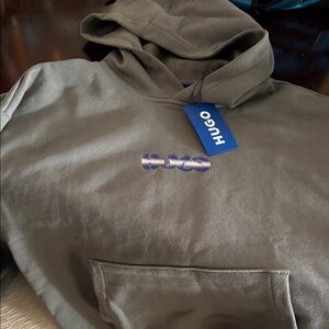 HUGO Olive Green Pullover Hoodie with Blue Logo Tag